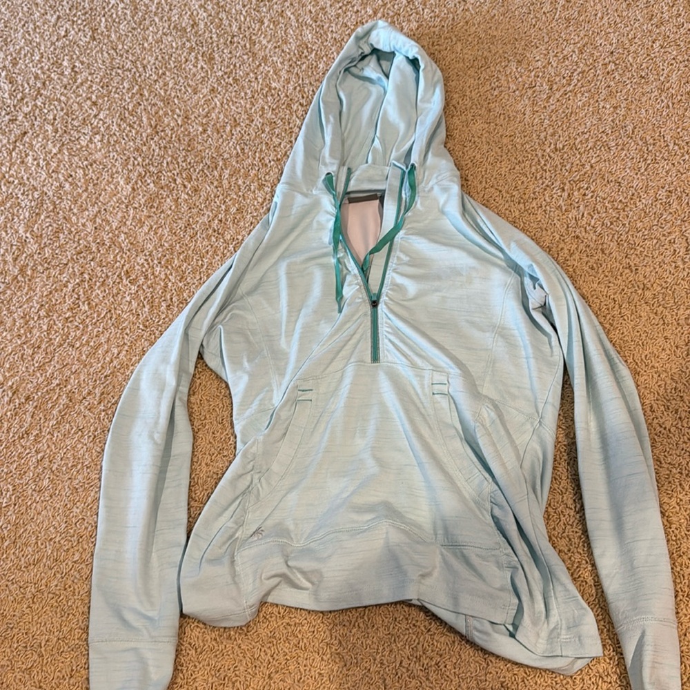 Athleta teal sweatshirt with a hood. Size large.